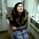 A brunette British girl with glasses is videotaped peeing on the toilet by her girlfriends.